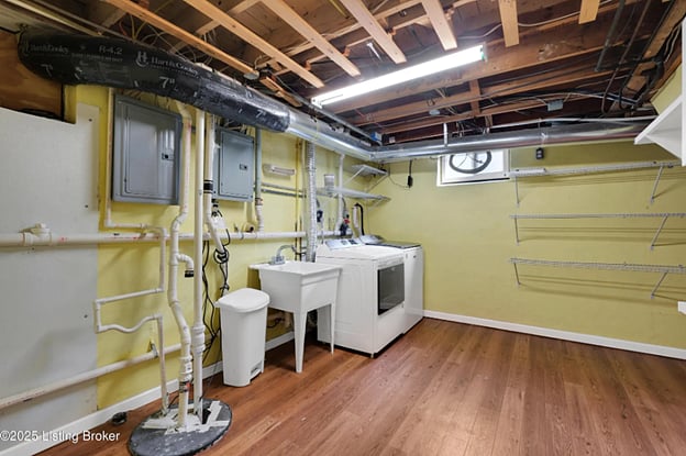 Basement washer/dryer area with some storage space