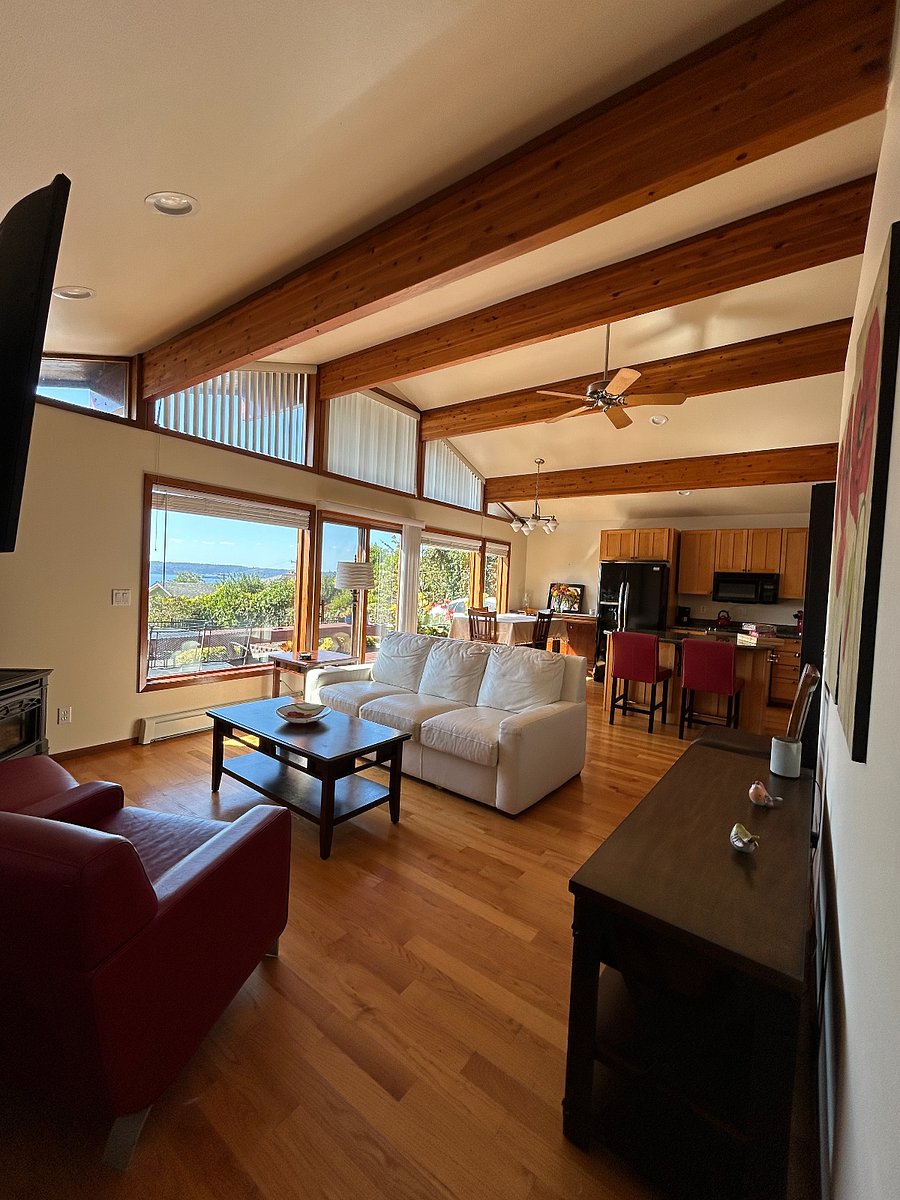Living Room with Wall of Windows, Dining Room w/ Buffet, Kitchen