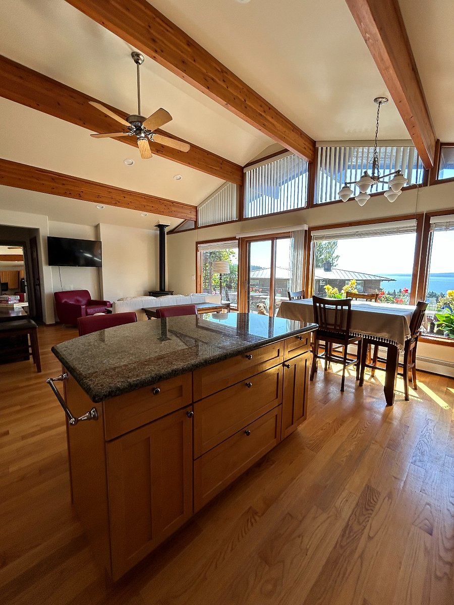 Kitchen- Granite Island, Living Room with 65" Smart TV, Dining Room