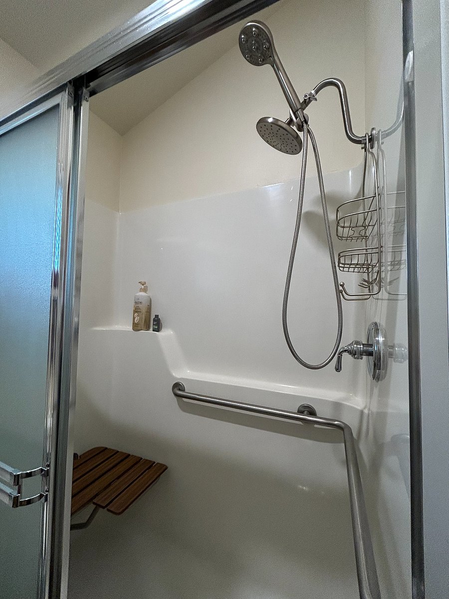 Master Shower with bench and hand rail /ADA