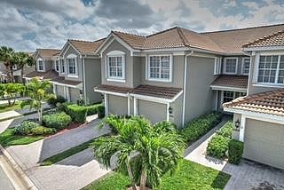 Front of condo, with private entrance & garage.