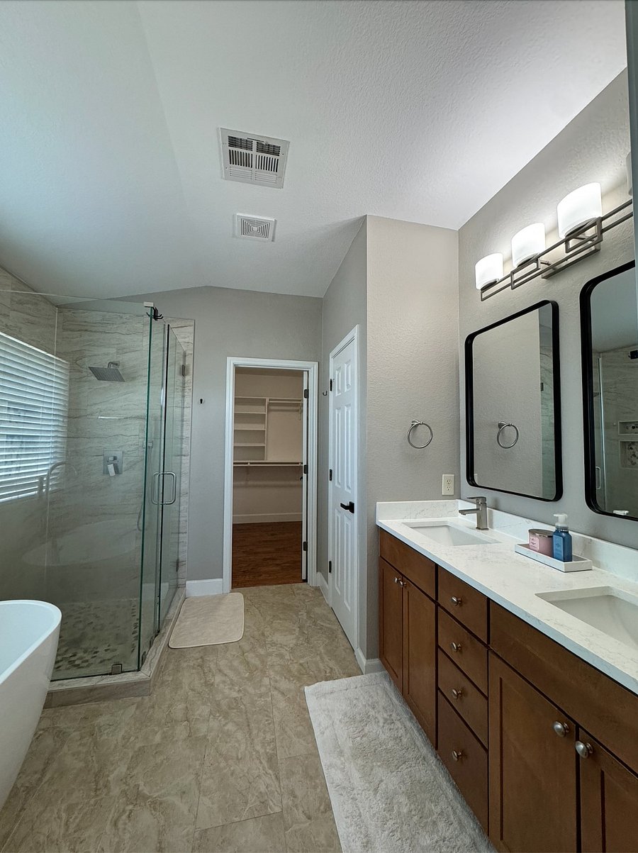 Updated master bath with glass shower and freestanding tub!