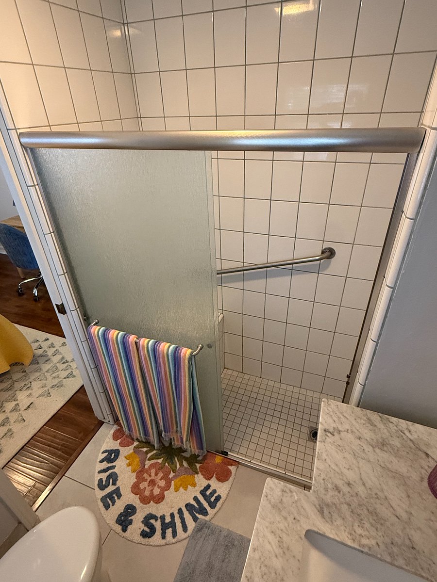 Clean walk in tile shower