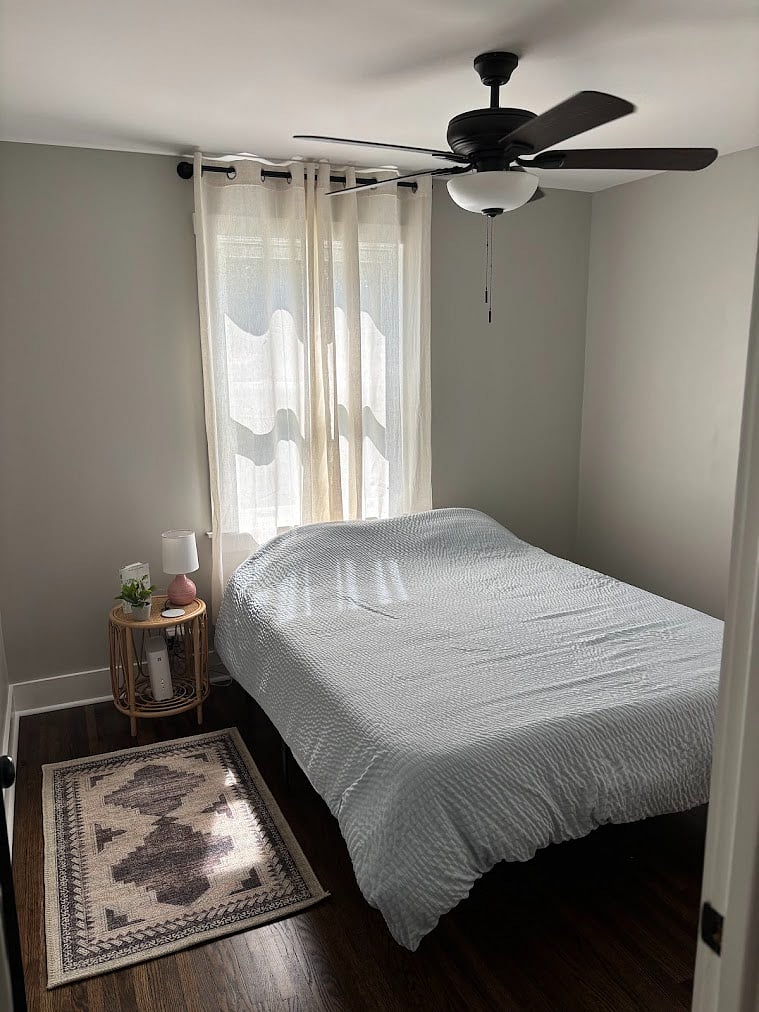 queen size bedroom with small closet and dresser