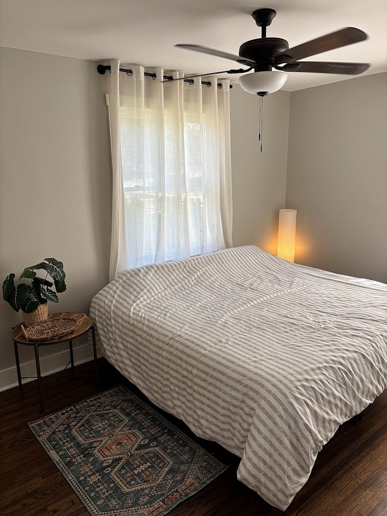 king size bedroom with small closet and dresser
