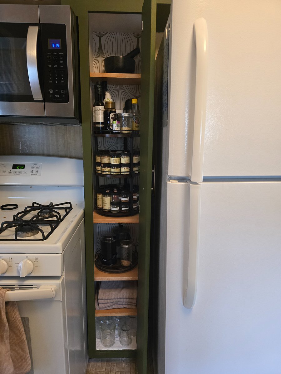 Kitchen spice cabinet. Kitchen is well set for home chefs!