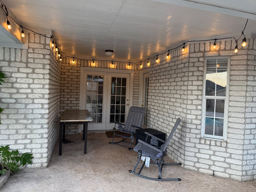 Back patio and entrance to living room and dining area.