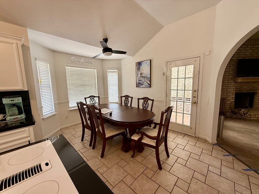 From living area arched way leads to dining area/kitchen.