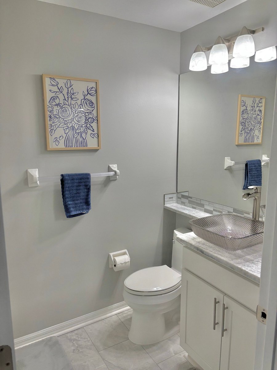 Shower/bath located to the left