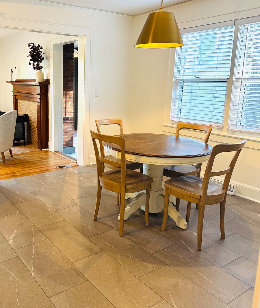 Dining room adjacent to kitchen and off the living room for great flow for family and friends