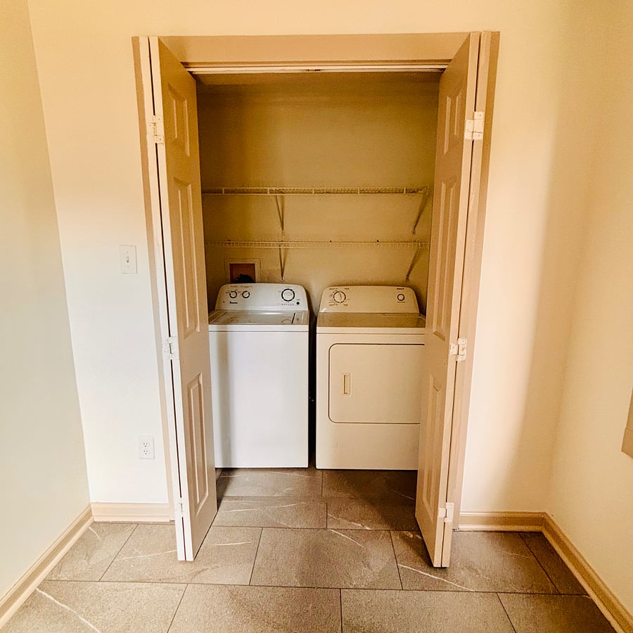 First floor laundry units. Full size washer and dryer and extra pantry storage.