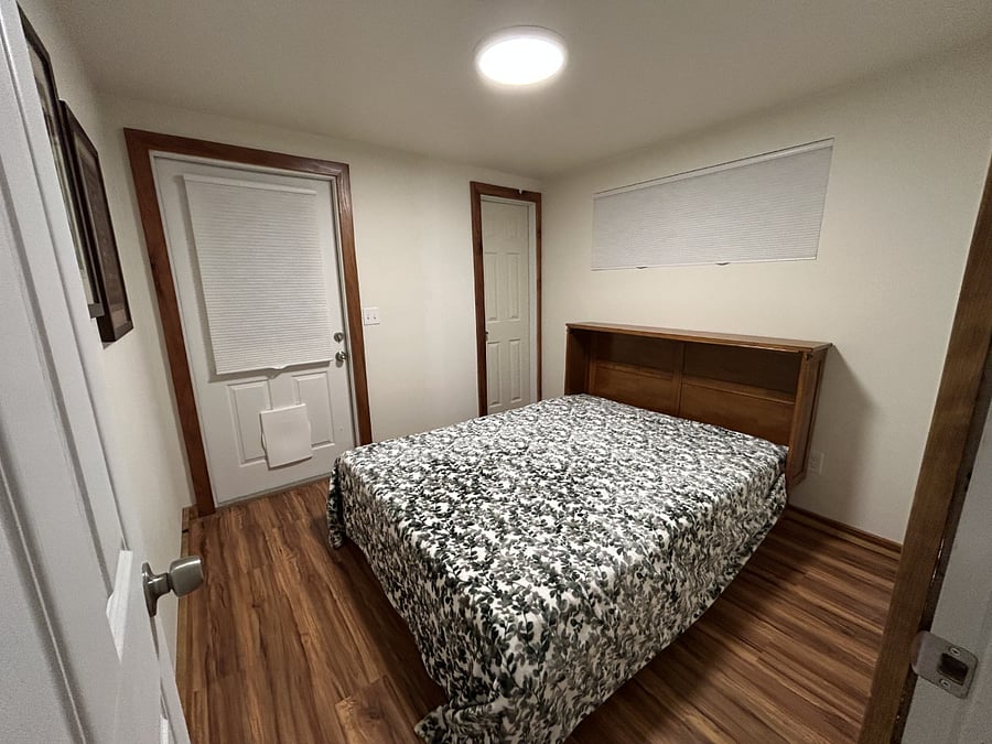 Bedroom with door to the backyard