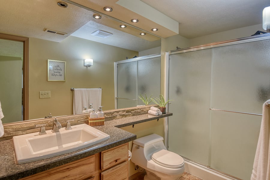 Stocked with plush towels and essentials for your convenience, with plenty of storage.