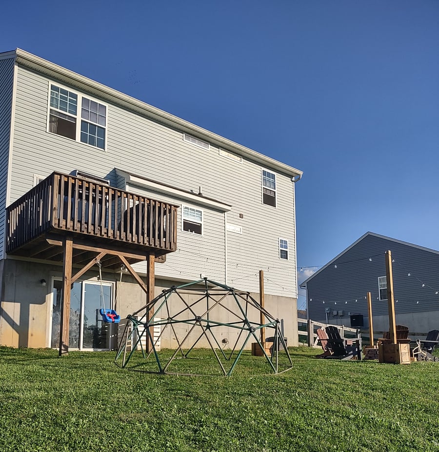 Back deck with grill, climbing dome and firepit