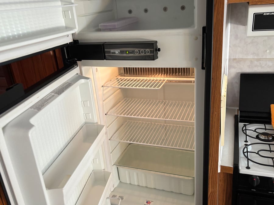 medium sized refrigerator and freezer