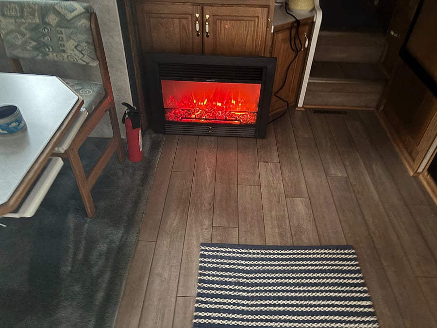 nice cozy addition a must in the northwest winters.....the fireplace provides enough heat to warm up the room.  Love it!
