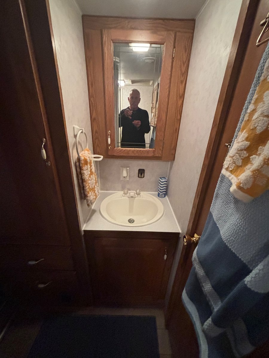 Bathroom sink and nice size medicine cabinet