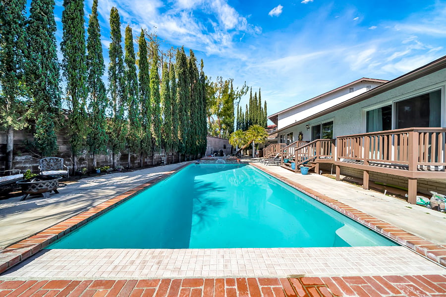 Large swimming Pool in backyard