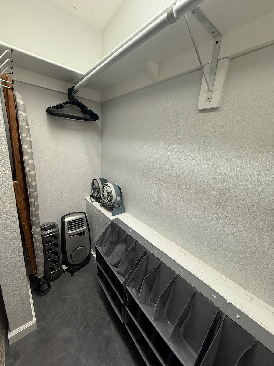 Primary Bedroom 1 - Closet
portable fans
portable heaters
ironing board
hangers
baskets for storage