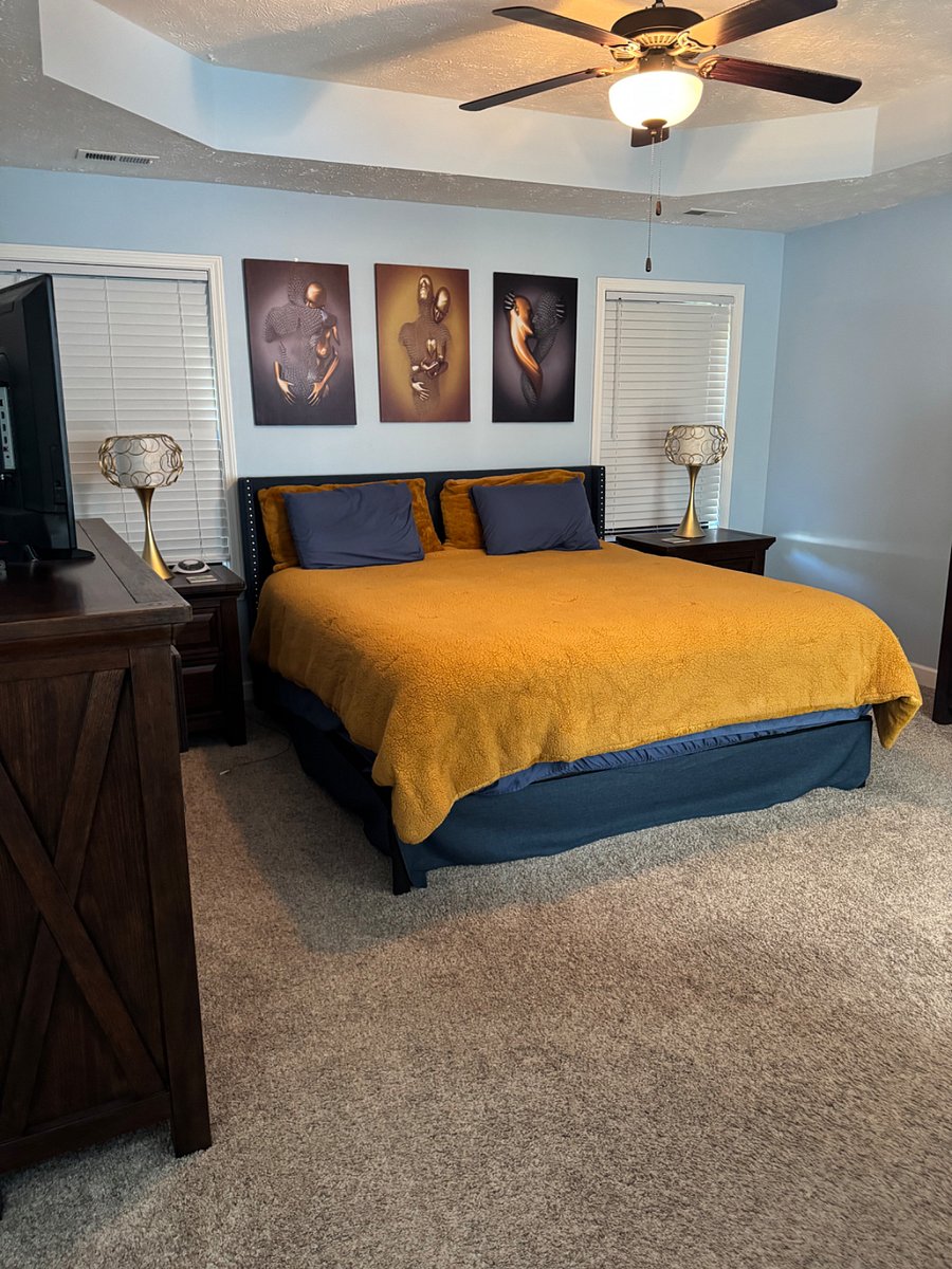 Master bedroom and bath. Round tub with separate shower. Dual vanity mirror and sinks. 