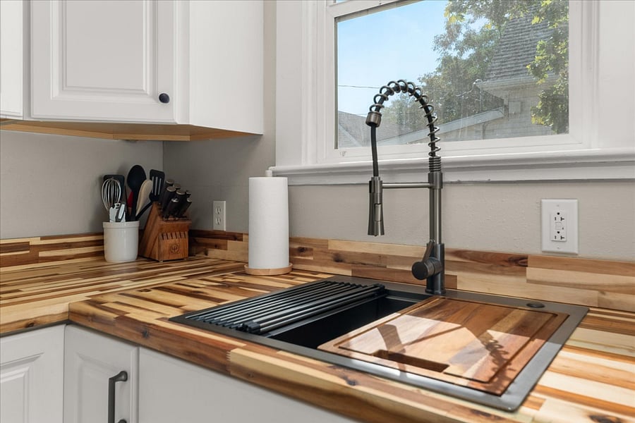 large kitchen sink & butcher block countertops
