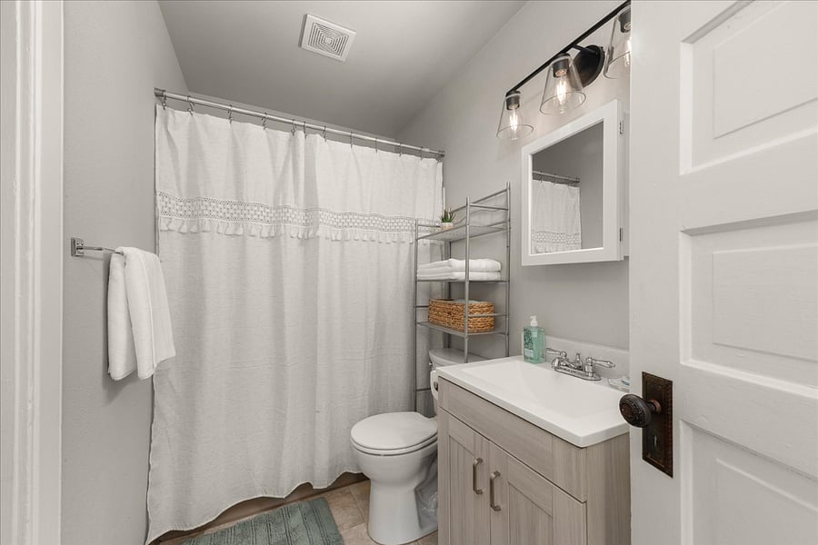 full bathroom with tub & shower