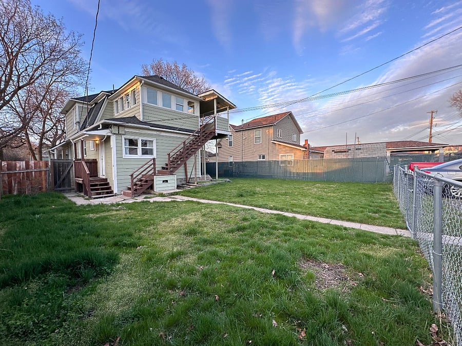shared, fully fenced backyard with back door entrance & private parking