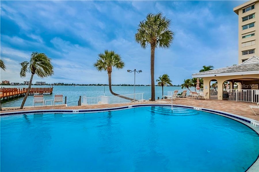 Pool, Pier, Cabana with Grills and Restrooms directly beside my building.