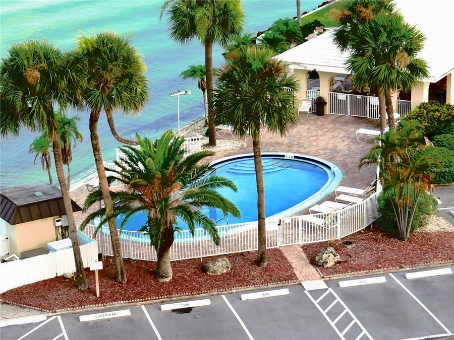 Pool, Pier, Cabana with Grills and Restrooms directly beside my building.