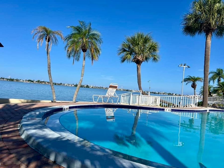 Pool, Pier, Cabana with Grills and Restrooms directly beside my building.