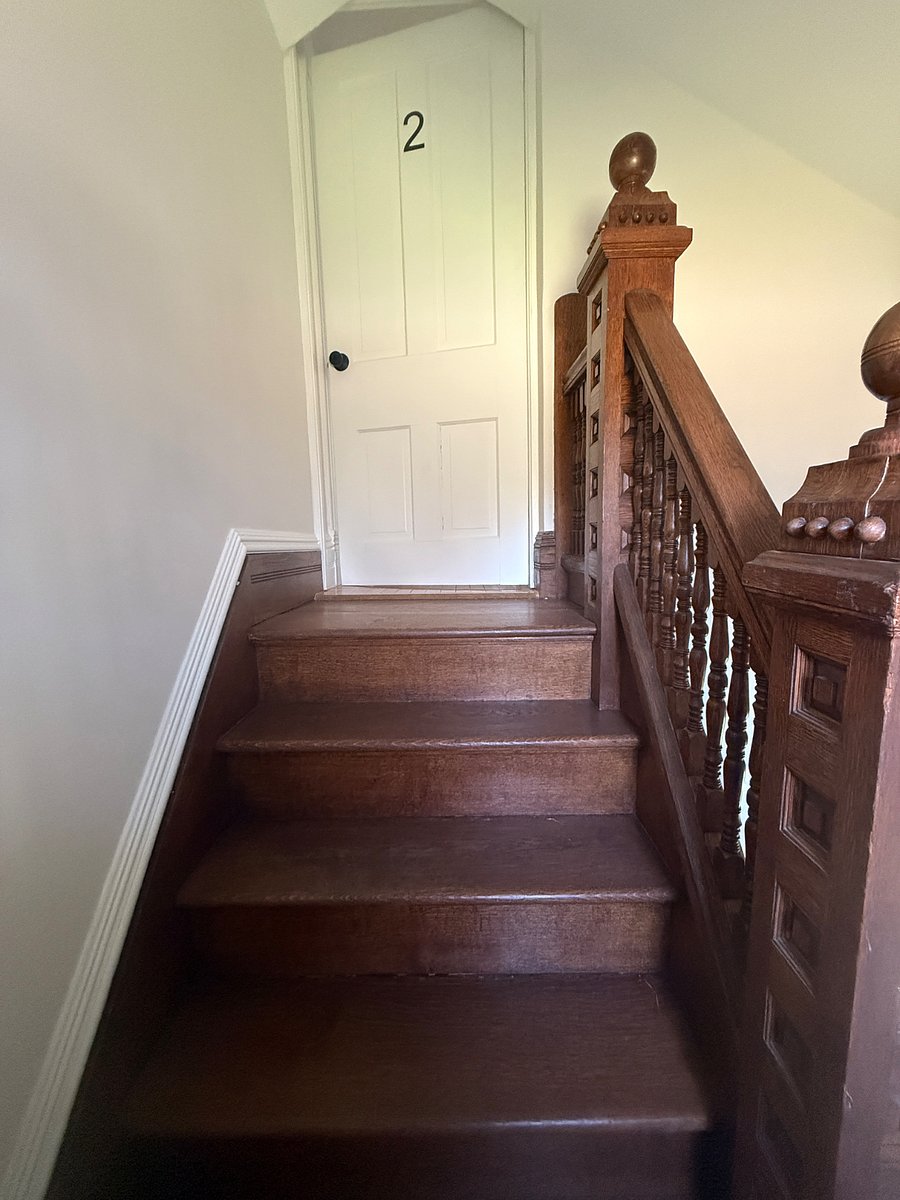 Interior steps leading to unit #2 apartment.