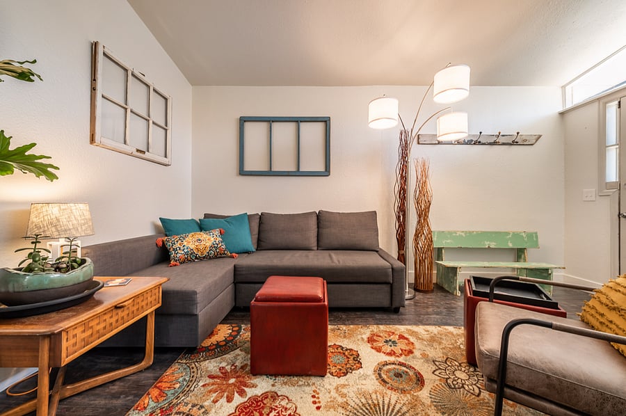 Living room has a Q size pull out couch