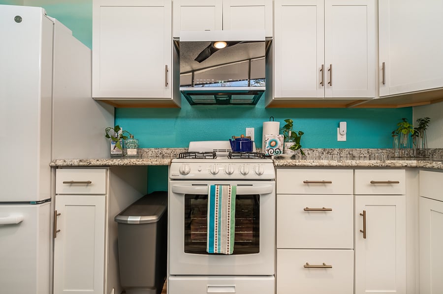 Full sized fridge, microwave, stove and plenty of storage