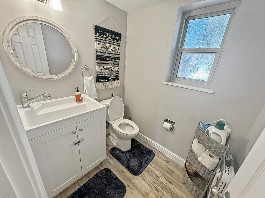 Downstairs Half Bath connected to laundry room