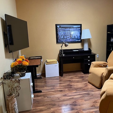 Den with very large TV two very comfortable recliners
