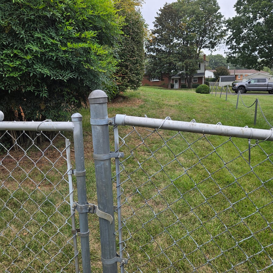 Access to the back of the house is through the front yard. Parking is on the street at the front of the house.