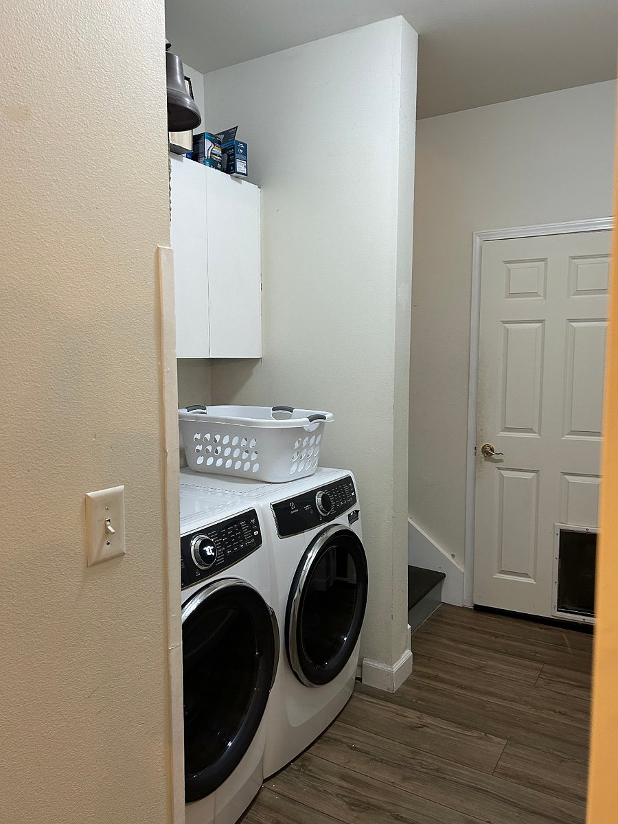 laundry is right at the bottom of the stairs that access the rental suite. Shared with homeowners.