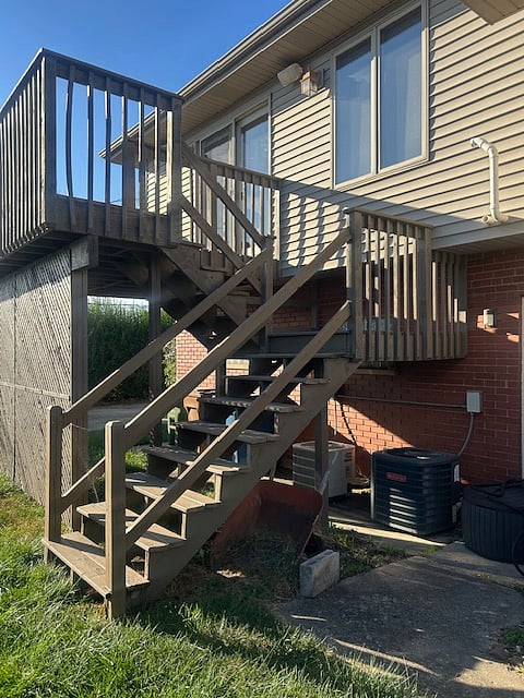 Back deck with entry to living area.