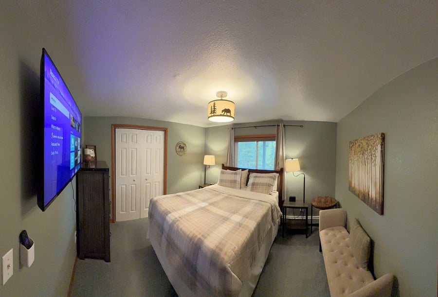 Our "smallest" guest room is still big enough to walk around all sides of the queen bed and have friends hang out with you on the stuffed bench seats