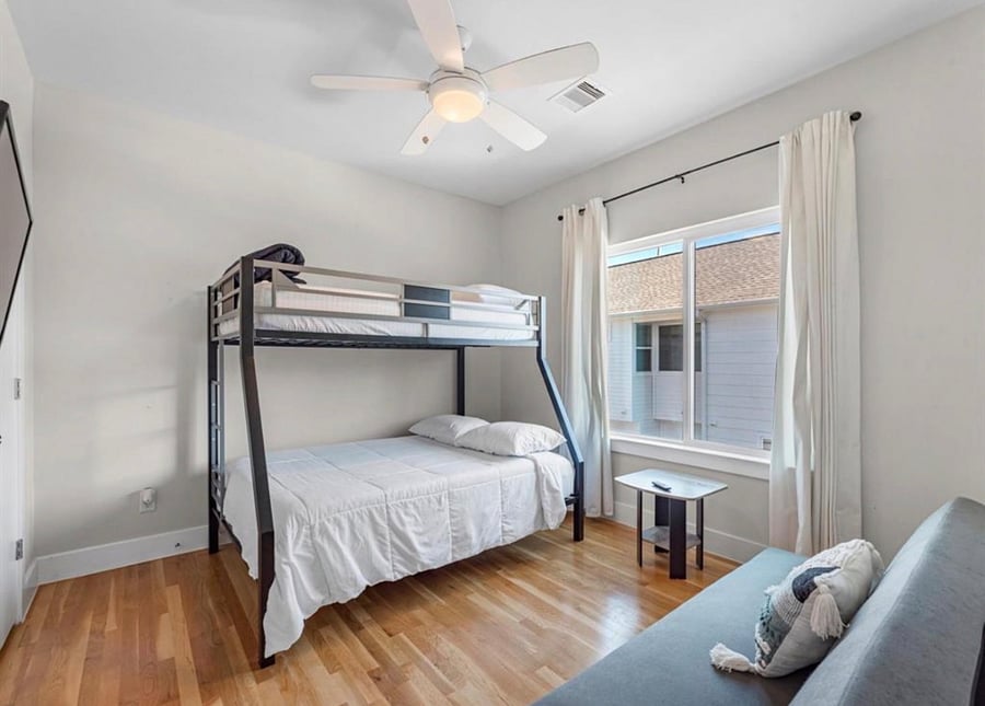 Bunk bed in this room with TV 