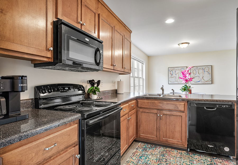 Spacious kitchen with all of the essentials for cooking meals
