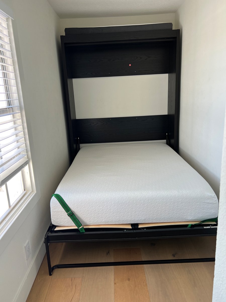 second bedroom or office with Murphy bed, no door.