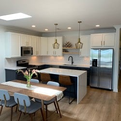 Alternate view of kitchen and dining area