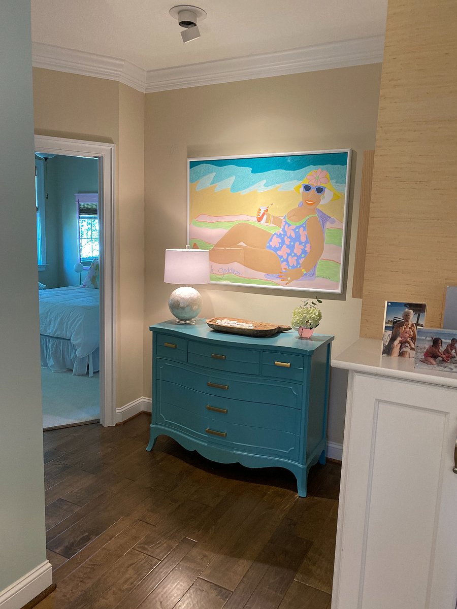 Hallway between Master and Queen bedrooms and laundry room.