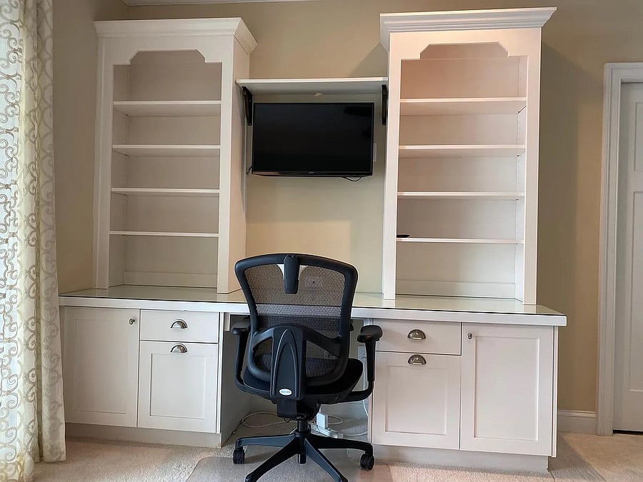 Built-in desk in the bedroom with two Queen beds.