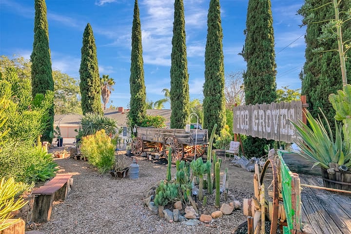 The meditation garden at TCB Groves featuring original wagons from the 1800s