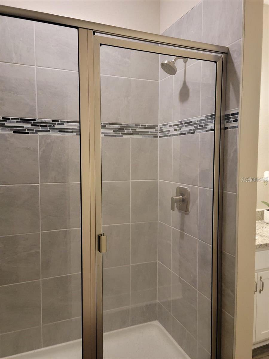 Glass surround shower in Master