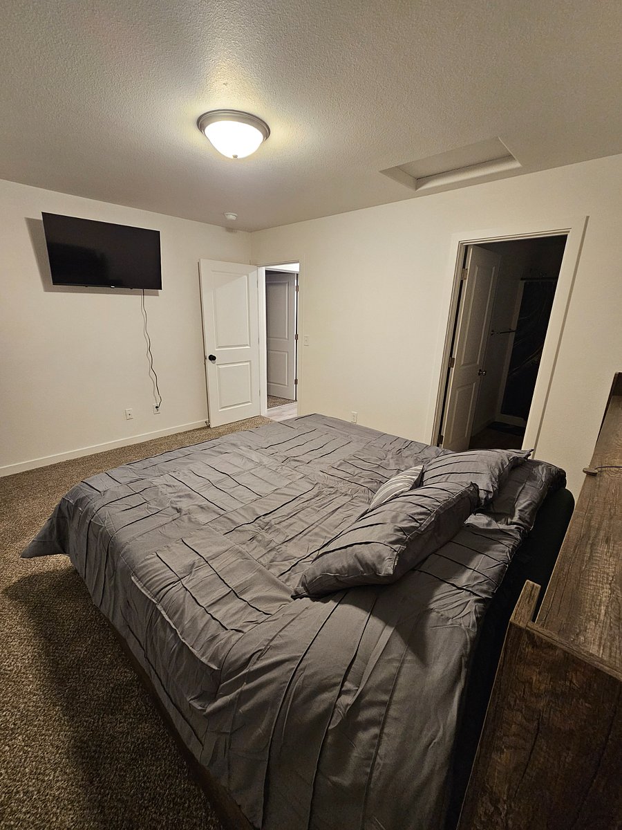 Master bed with 43" TV