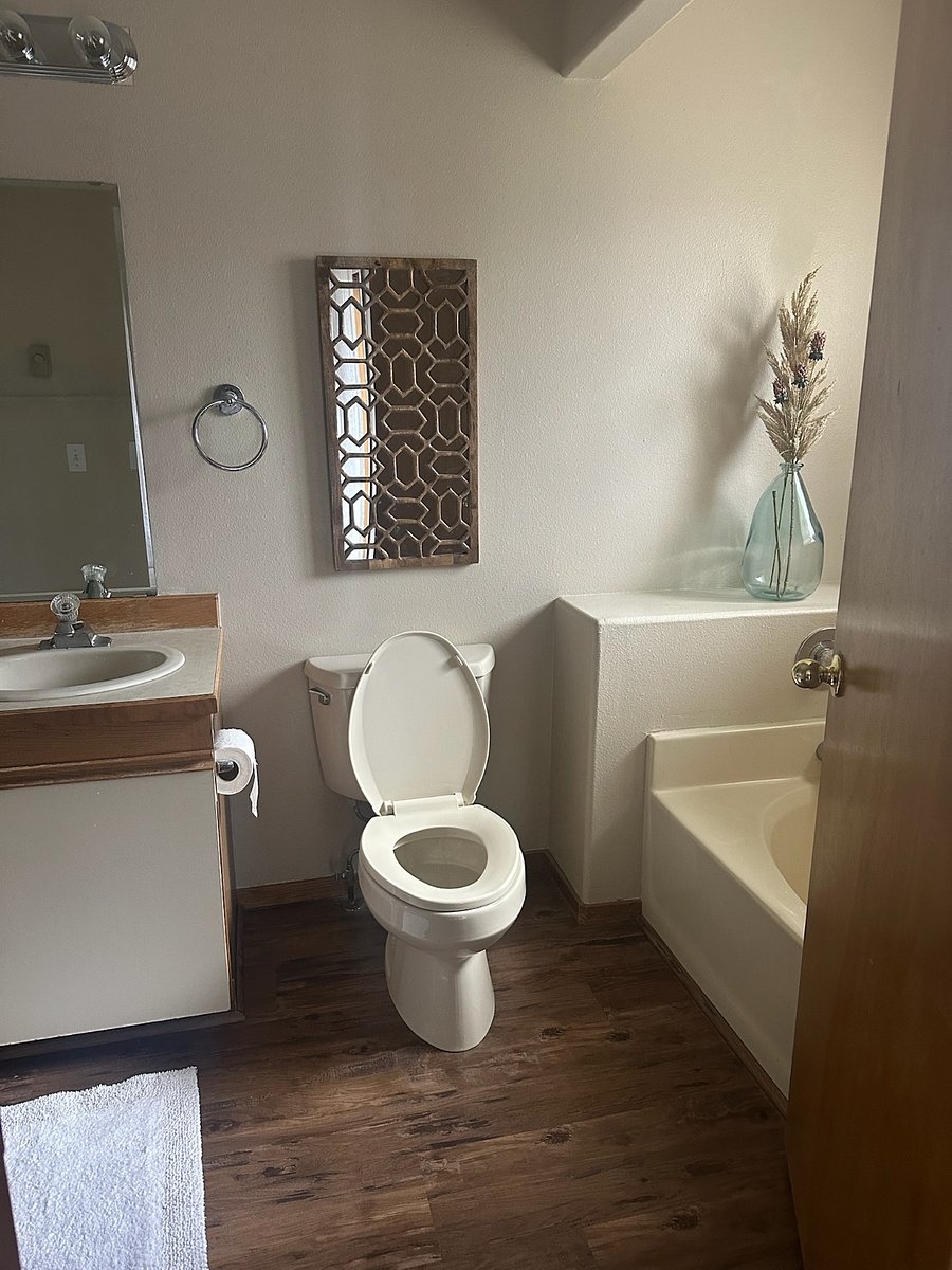 One of the two master bathrooms