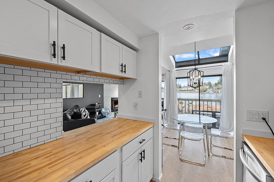 Galley Kitchen with Stainless Appliances